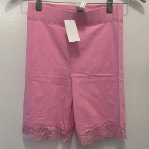 BNWT Pink bike shorts with lace detail